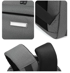 Détails du tissu Oxford gris et du rembourrage en maille sur le sac à dos d'affaires
