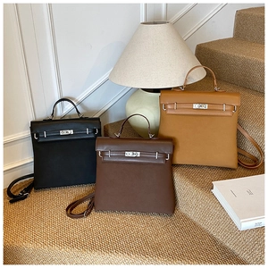 Detailed view of vintage matte leather backpacks in black, dark coffee and light brown colors