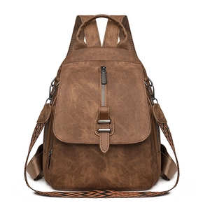 Brown vintage PU leather backpack with a decorative woven strap and metal zipper