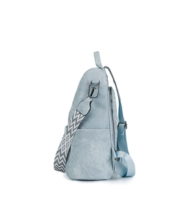 Light blue dual-use backpack featuring a geometric pattern woven wide shoulder strap
