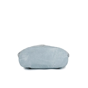 Detailed bottom view of light blue backpack showing stable oval base and wave patterns