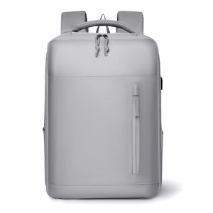 Minimalist grey water-resistant business laptop backpack with external USB charging port