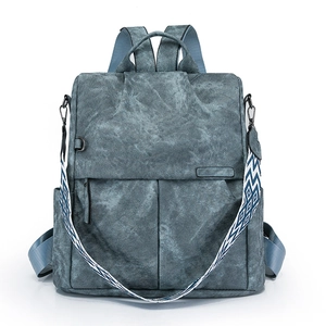 Zaino antifurto grigio-blu minimalista da donna con trama opaca in stile vintage