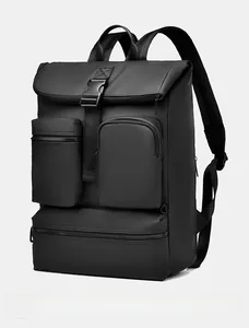 Detailed side view of black waterproof business backpack with pockets and buckle