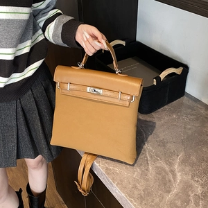 Brown frosted leather vintage backpack with metal buckle closure and top handle strap