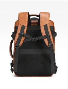 Rear view of brown leather business backpack with breathable mesh padding and S-shaped straps