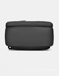 Detailed bottom view of black business backpack showing durable waterproof fabric and seams