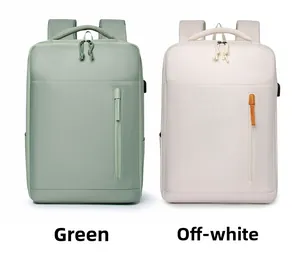 Front detail of minimalist business backpacks in light green and cream with USB port