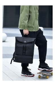 Detail of waterproof functional backpack with buckle closure and multiple zipper pockets