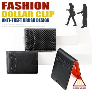Detail view of carbon fiber RFID blocking wallet with multiple card slots and orange lining