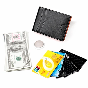 Detail of genuine leather AirTag wallet with card slots and orange edge accents