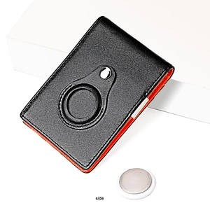 Detailed side view of genuine leather AirTag wallet with black and orange contrast design