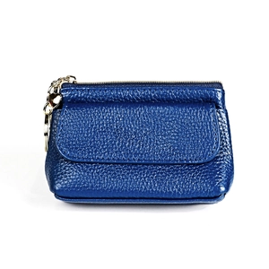 Close-up of navy blue lychee grain leather coin purse with heart zipper and key ring