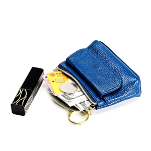 Detail of royal blue pebble leather coin purse showing card slots and gold keyring