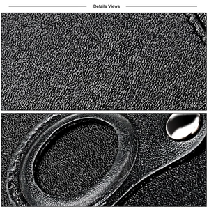 Macro detail of genuine leather wallet featuring grainy texture and a metal rivet fastener