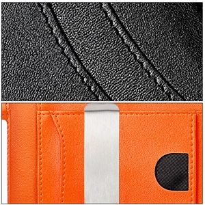 Macro shot of genuine leather Airtag wallet with lychee pattern and metal money clip