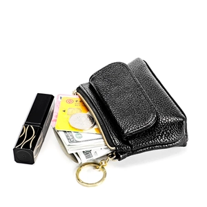 Internal view of black pebble leather coin purse showing cash and cards storage