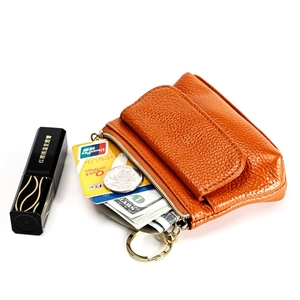 Orange genuine leather coin purse with key ring showing bank cards and cash capacity