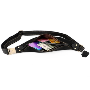 Detail view of large capacity interior for crazy horse leather waist bag with gold buckle
