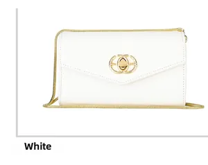 Detail of white envelope crossbody bag with gold chain strap and oval metal clasp