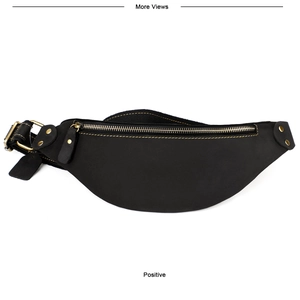 Detail of vintage black leather fanny pack with brass hardware and yellow contrast stitching