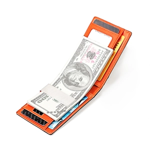Orange leather bifold wallet with metal money clip and AirTag tracking holder