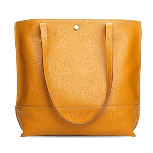 Sac fourre-tout minimaliste en cuir jaune gingembre avec coutures blanches