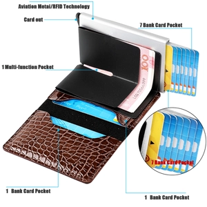 Detail view of RFID blocking crocodile leather wallet with automatic pop-up aluminum card holder
