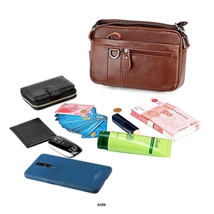 Internal capacity view of brown leather crossbody bag with multiple zip compartments