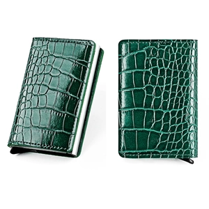 Detailed views of dark green crocodile texture card holder with aluminum pop-up case