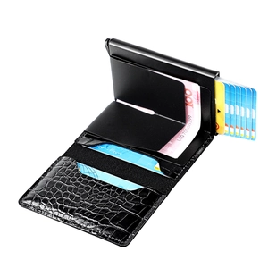 Detail view of the black crocodile pattern wallet with RFID blocking metal card slot