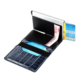 Macro view of blue crocodile leather card holder with RFID blocking aluminum wallet case