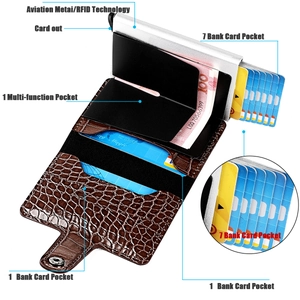 Detail of RFID metal wallet with brown crocodile leather and pop-up card mechanism