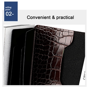 Detail view of the brown crocodile leather card holder with multiple internal card slots