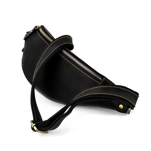 Vintage black crazy horse leather waist bag with yellow contrast stitching and bronze hardware