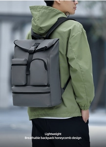 Detail of dark grey business backpack with breathable honeycomb back and side zipper