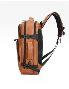 Side view of brown leather business backpack with USB charging port and breathable mesh straps