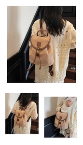Detail of light brown suede backpack featuring drawstring closure and leather trim accents