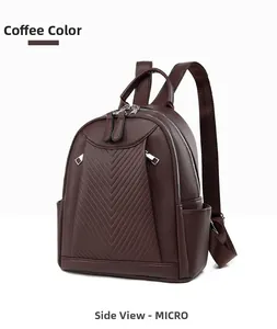 Detail view of coffee brown pebbled leather backpack with V-shaped quilted stitching