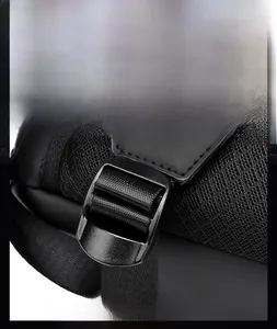 Detail of adjustable thick buckle and breathable mesh fabric on black backpack strap