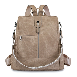 Sac à dos femme kaki en similicuir avec bandoulière tissée géométrique moderne en vue de face