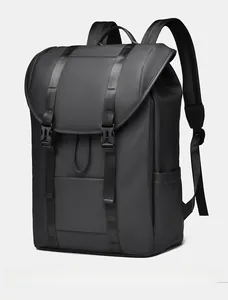 Side view of a black minimalist backpack with matte waterproof fabric and buckle straps
