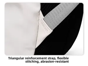 Detailed macro shot of the reinforced triangular stitching on the large capacity backpack