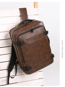 Detailed side view of dark brown faux leather backpack showing multiple zip compartments