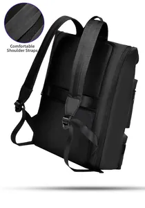 Detail of breathable honeycomb mesh padding and wide shoulder straps on a black backpack