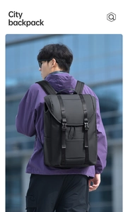 Close-up of black water-resistant fabric and buckle detail on this large travel backpack