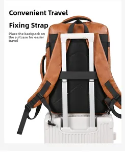 Brown PU leather travel backpack detail showing luggage strap fixed on a suitcase handle