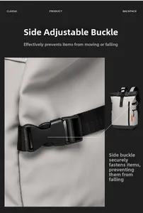 Détails des boucles latérales et de l'étiquette orange sur le sac à dos gris extensible