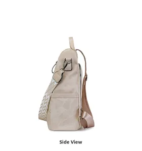Vue latérale du sac à dos en toile beige avec sangles géométriques et fermeture éclair
