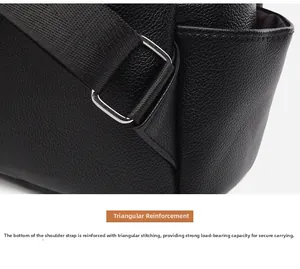 Detail of metal buckle and reinforced stitching on black lychee grain leather backpack